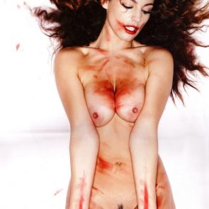 Kelly Brook covered with red paint