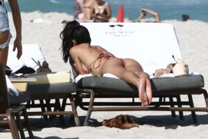 Good-Looking Brunette Chantel Jeffries Shows Her Ass and Legs on a Beach